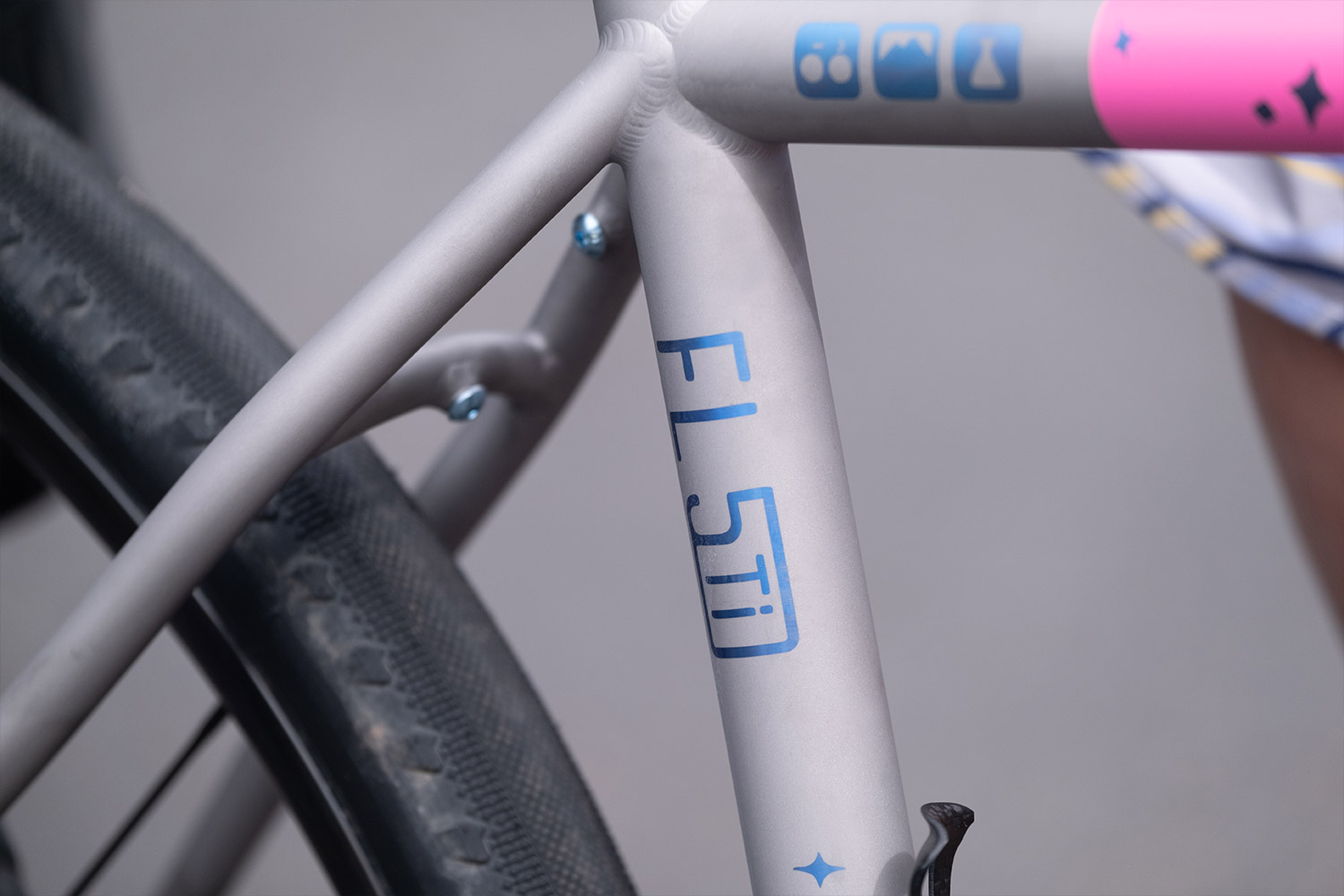 Blue anodized titanium gravel bike. Pink cerakote on bicycle. Flaanimal 5 Titanium by Rodeo Labs.